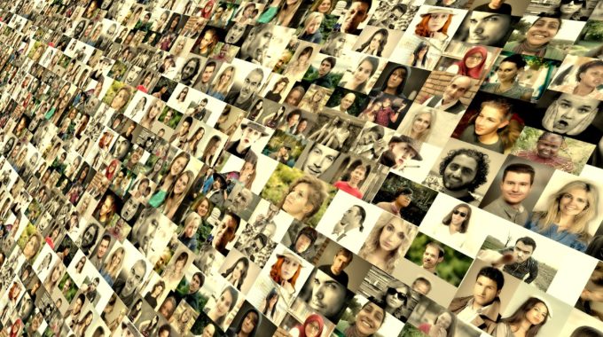 A Large Wall Of Small Photos Of Humans From All Over The World