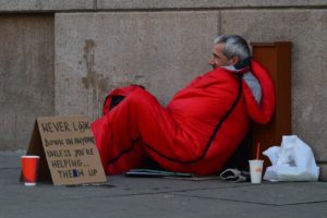 inclusive holiday celebration homeless man photo