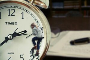 Neurocognitive Differences | Woman climbing hands of a clock