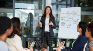 Shot of an attractive young businesswoman giving a presentation in the boardroom